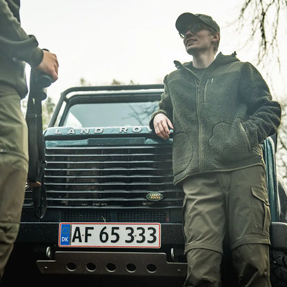 Land Rover Defender displayed on Seeland Thaw Fleece Jacket, cozy fleece jacket for cold days