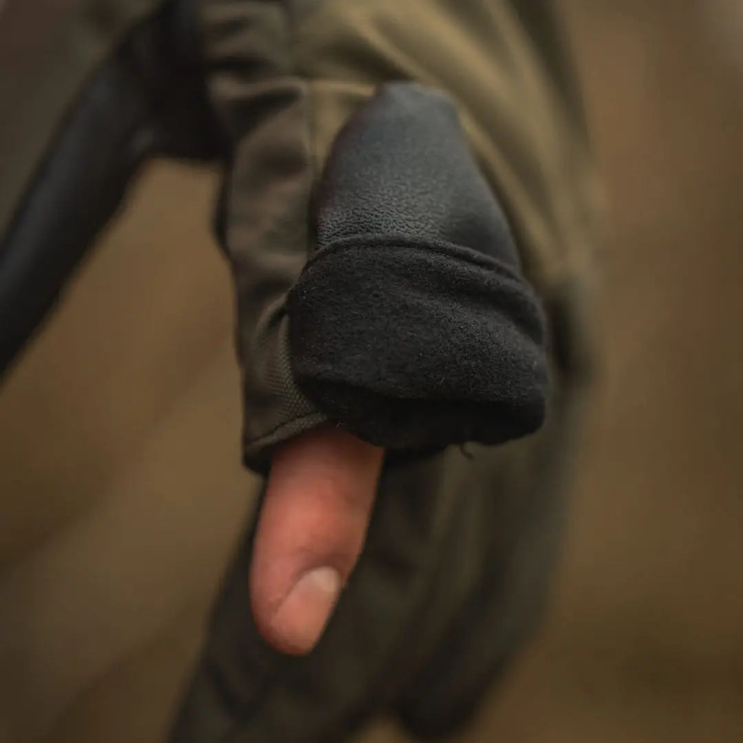 Gloved hand with exposed thumb from Seeland Trigger Fold-Back Gloves for hunting outdoors