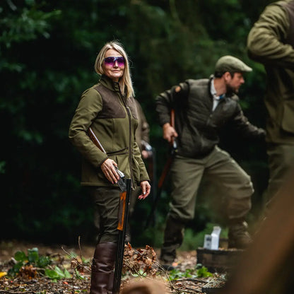 Hunting attire featuring the Seeland Wenlock Faye Ladies Jacket and shotgun in style