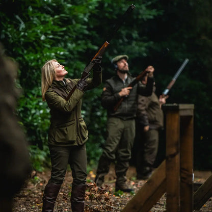 People shooting shotguns while wearing Seeland Wenlock Faye Ladies Jacket for hunting