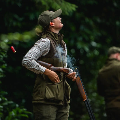 Woman shooting a shotgun in Seeland Wenlock Faye Ladies Waistcoat, perfect for country clothing