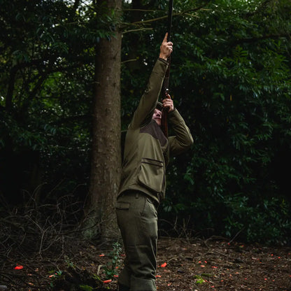 Hunter aiming shotgun while wearing the Seeland Wenlock Mens Jacket for optimal performance