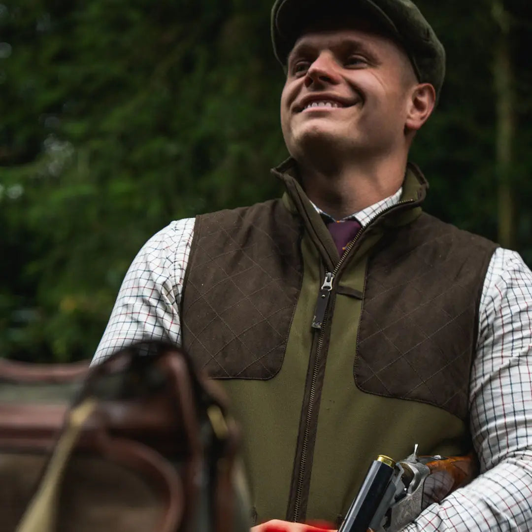 Smiling man in country clothing wearing Seeland Wenlock Mens Waistcoat for hunting outdoors