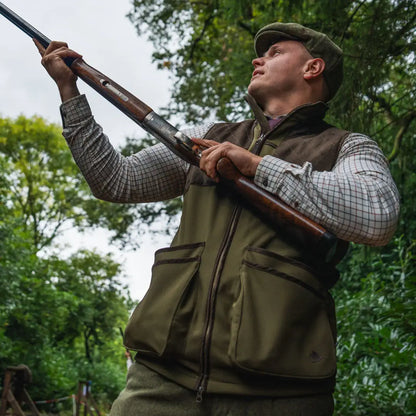 Man holding shotgun in Seeland Wenlock Mens Waistcoat, perfect for hunting and outdoors