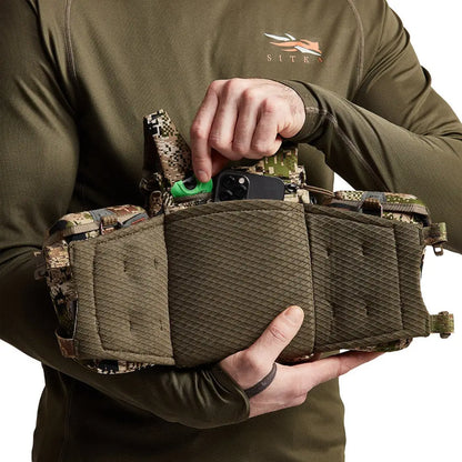 Camouflage hunting chest pack for big game hunters with the Sitka Mountain Optics Harness