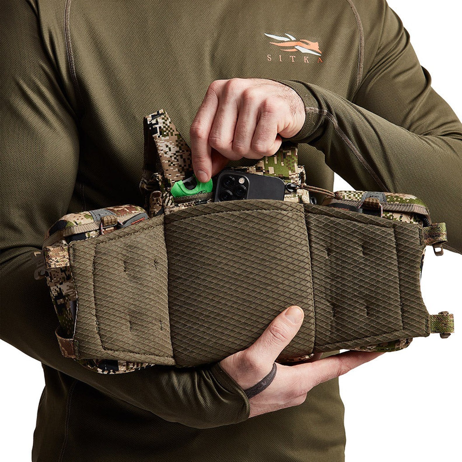 Camouflage hunting chest pack for big game hunters with the Sitka Mountain Optics Harness