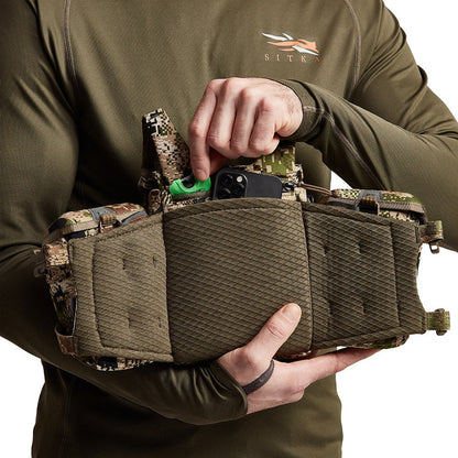 Camouflage hunting chest pack for big game hunters with the Sitka Mountain Optics Harness