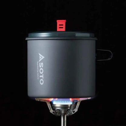 Covered cooking pot on a lit Soto Amicus stove, perfect for New River Pot adventures