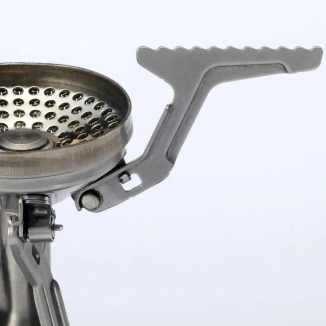 Metal camping stove burner featuring the Soto Amicus, perfect for outdoor adventures