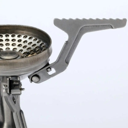 Metal camping stove burner featuring the Soto Amicus, perfect for outdoor adventures