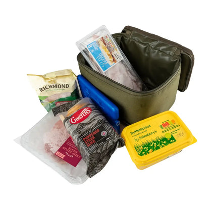 Green toiletry bag next to food and care items, featuring the Speero Bait Cool Bag