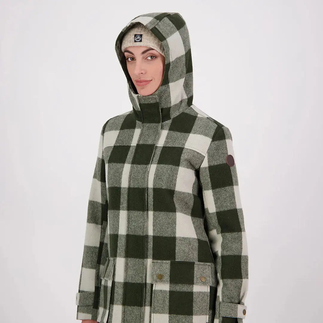 Woman in Swanndri Annmore merino wool overcoat with hood and beanie in winter style