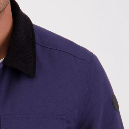 Navy blue Swanndri Barrytown V3 Canvas Jacket with black corduroy collar and patch