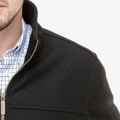 Black Swanndri Falcon Jacket with zip front and checkered shirt underneath