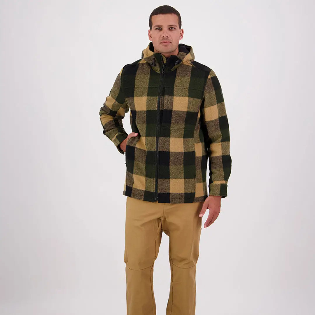 Man wearing green and tan plaid Swanndri Hudson Wool Hoodie, cozy wool hoodie look