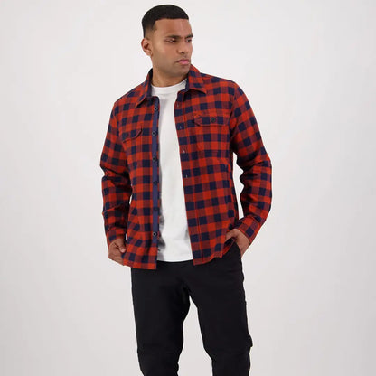 Red and navy checkered flannel shirt over white tee, perfect for Taranaki Tailor country clothing