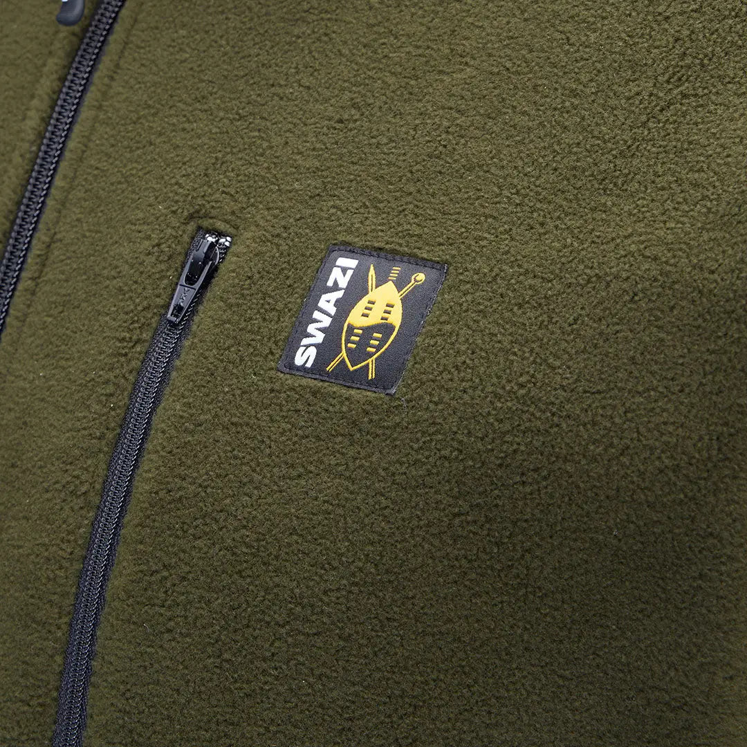 Green fleece jacket on Swazi Bush Shirt, perfect for outdoor adventures with Swazi Bush vibe