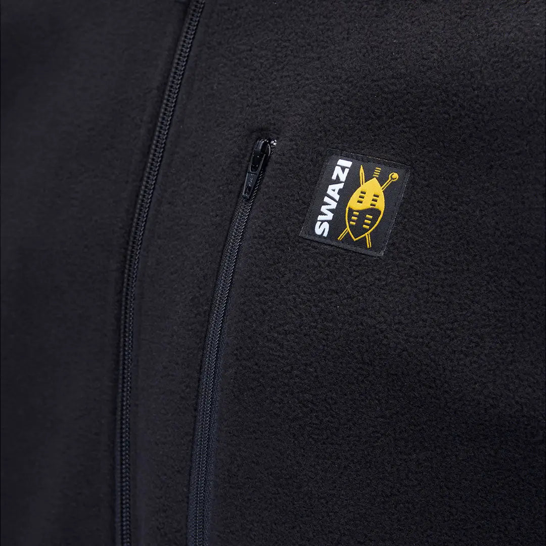 Close-up of black fleece jacket detail on Swazi Bush Shirt for ultimate bush shirt style