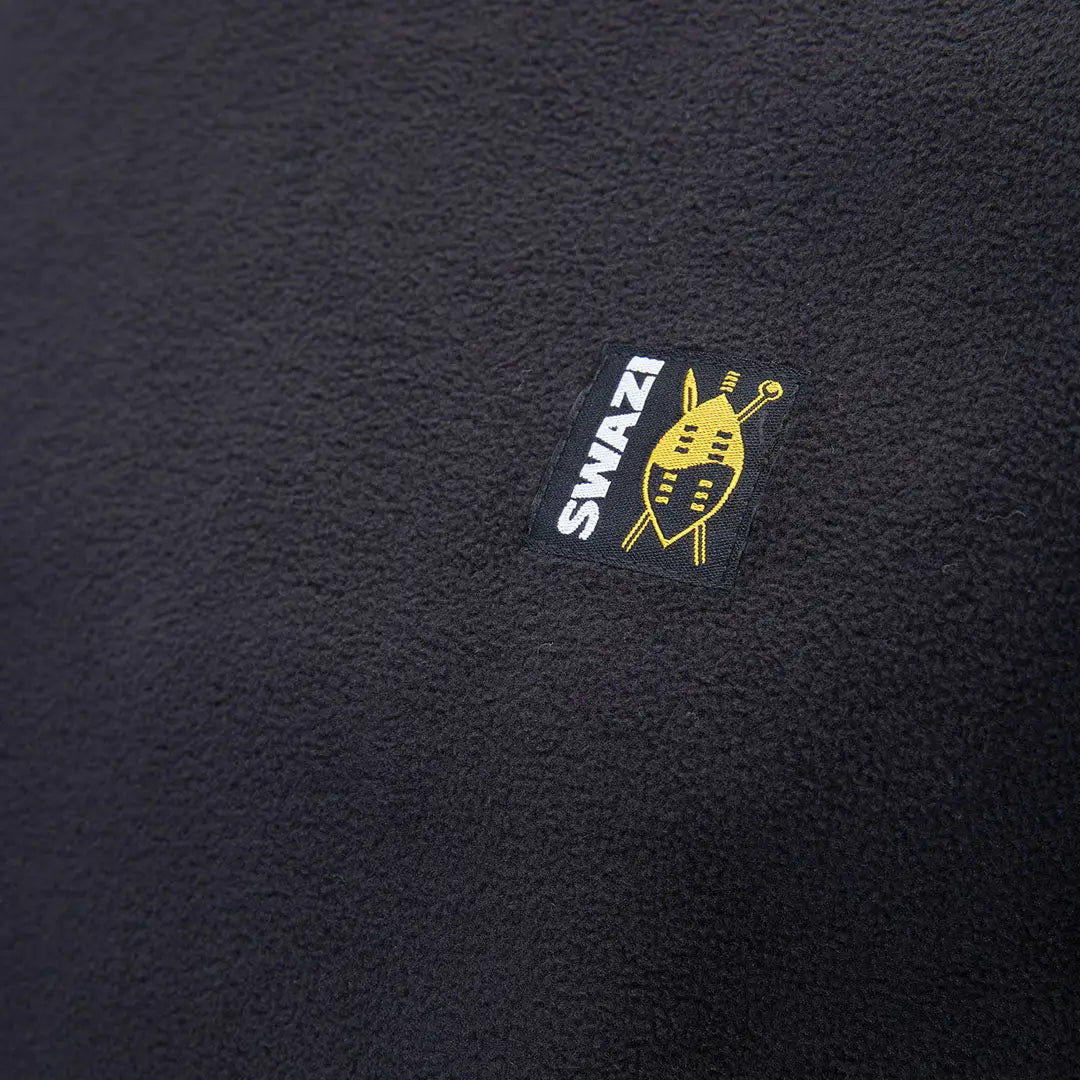 Black fleece fabric with Swazi Long Sleeve Micro Top logo for stylish long sleeve micro wear
