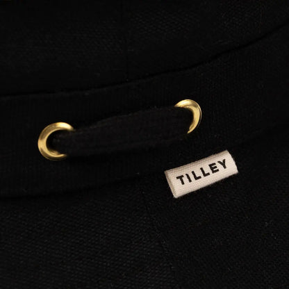 Black hoodie drawstring with metal grommets on Tilley Iconic T1 Bucket Hat