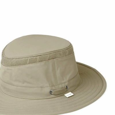Beige Tilley LTM5 Airflo Hat with mesh band and metal accent for stylish sun protection