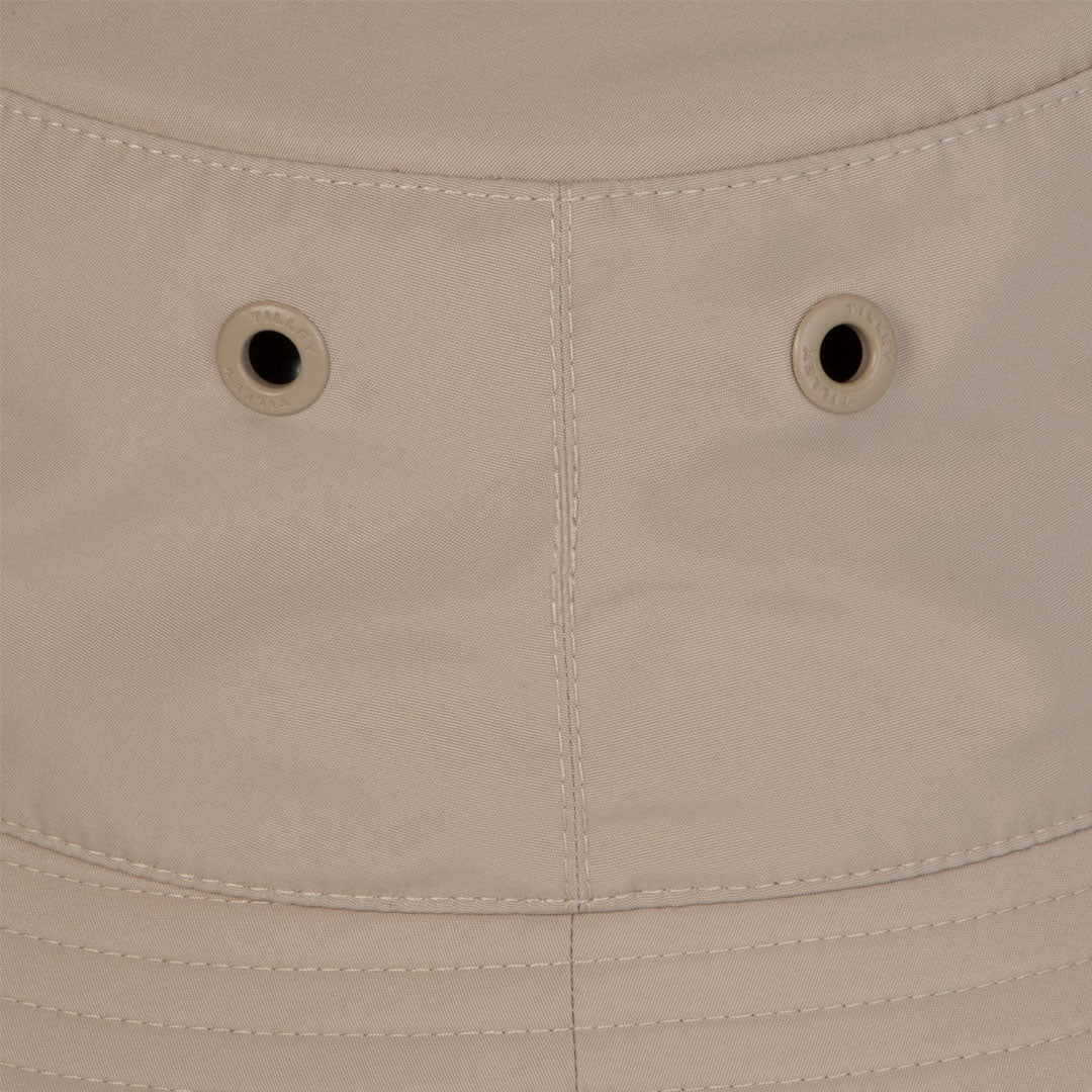 Beige bucket hat detail of the Tilley Logo Technical T1 Bucket for stylish sun protection