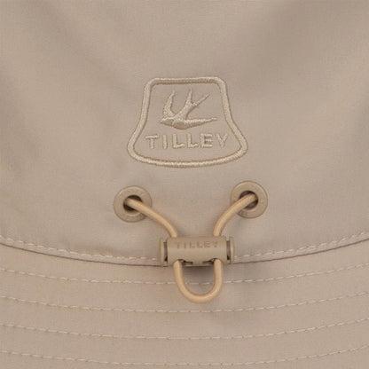 Beige Tilley Logo Technical T1 Bucket Hat perfect for outdoor adventures