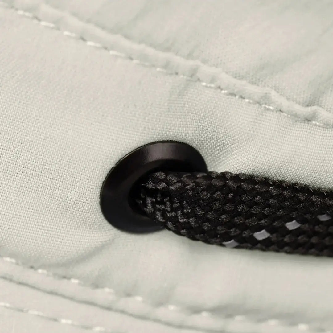 Black drawstring through grommet on Tilley Ultralight T5 Classic made from recycled nylon